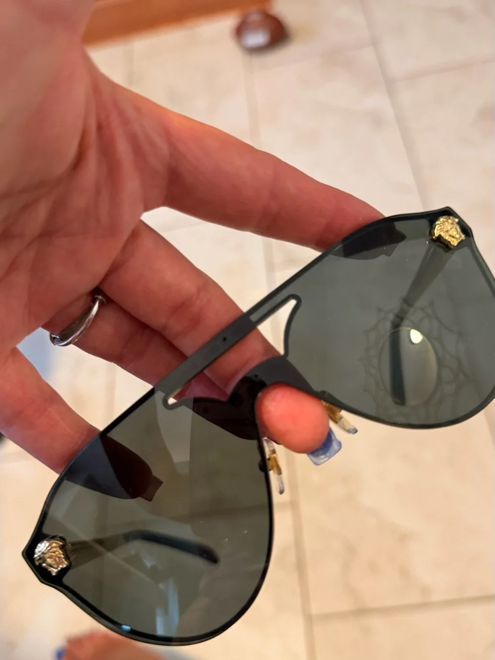 Versace Men’s Black Shield Sunglasses with Gold Medusa Details